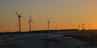 Wind turbines at sunset © Copyright DCC